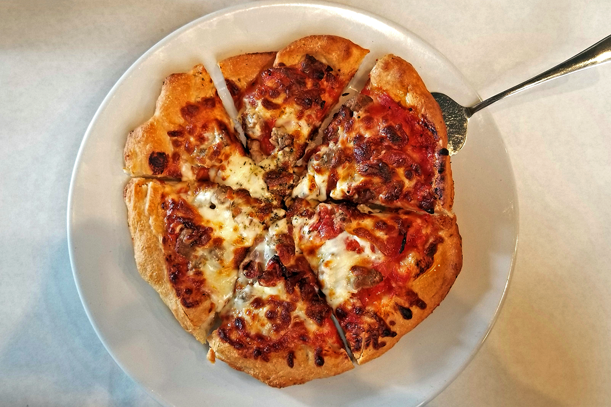 Tre Carne Pizza at the Vine